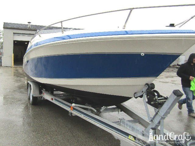 Wellcraft boat with completed exterior repairs and new exterior finish