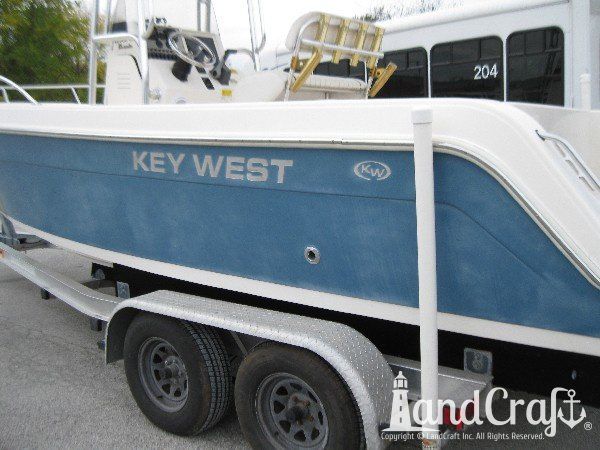 Key West fiberglass boat with faded and chalky exterior finish
