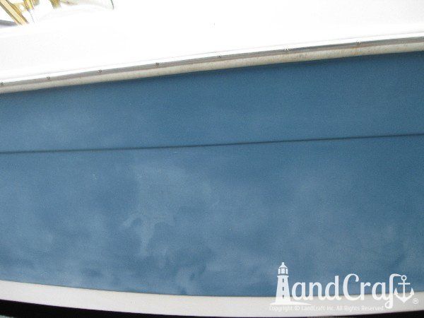 Key West fiberglass boat with faded and chalky exterior finish