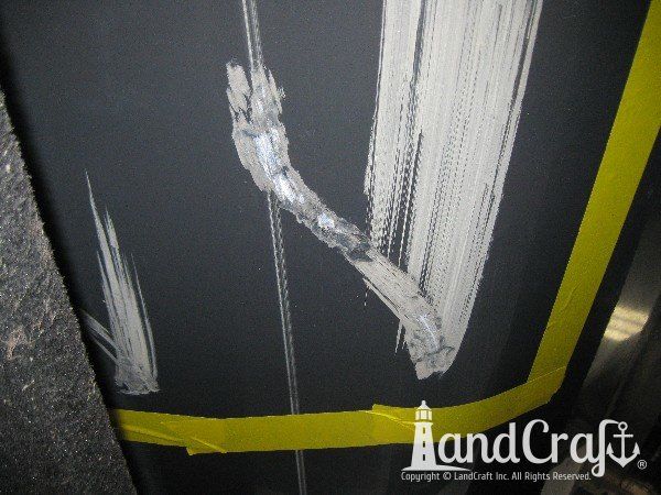 Grounding damage on hull of Nauticstar center console fiberglass boat