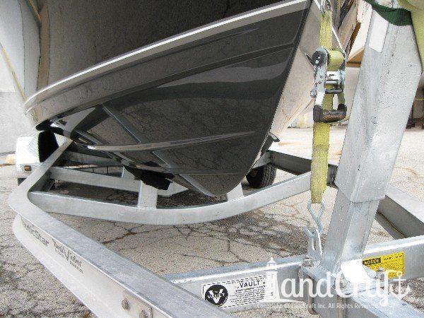 Completed fiberglass and gelcoat repairs on the hull of this Nauticstar center console fiberglass boat