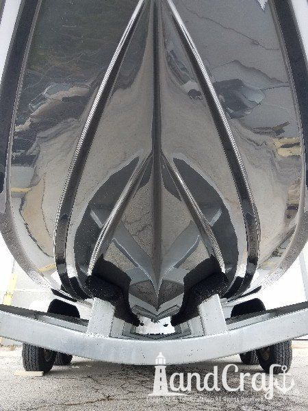 Completed fiberglass and gelcoat repairs on the hull of this Nauticstar center console fiberglass boat