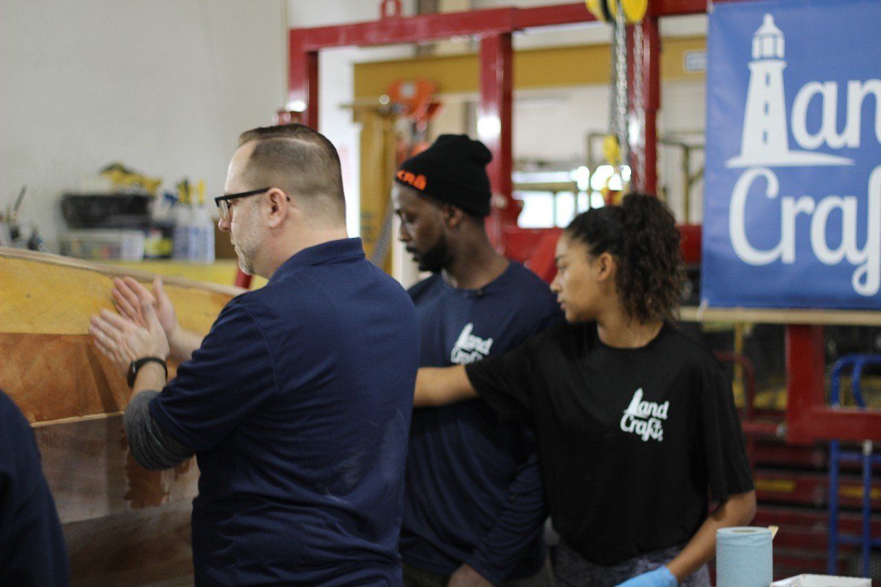 Jake and Charles discuss the Row4Kids boat build project at LandCraft