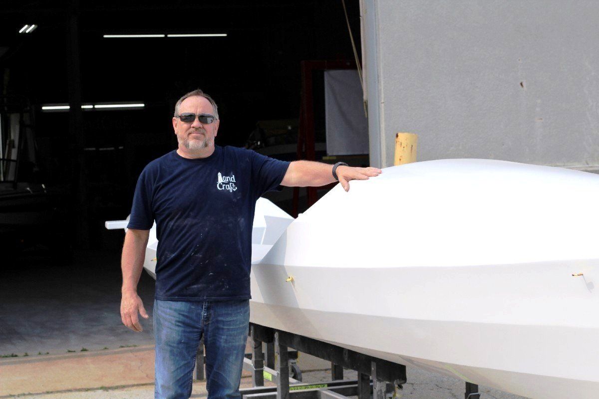 Keith Lekberg with the Row4Kids boat at LandCraft