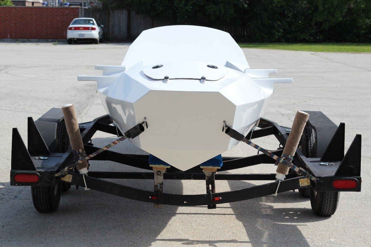 Row4Kids boat on the custom retrofitted trailer ready for delivery