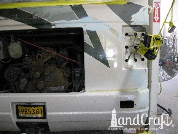 Country Coach motor coach with rear end fiberglass damage in the repair process