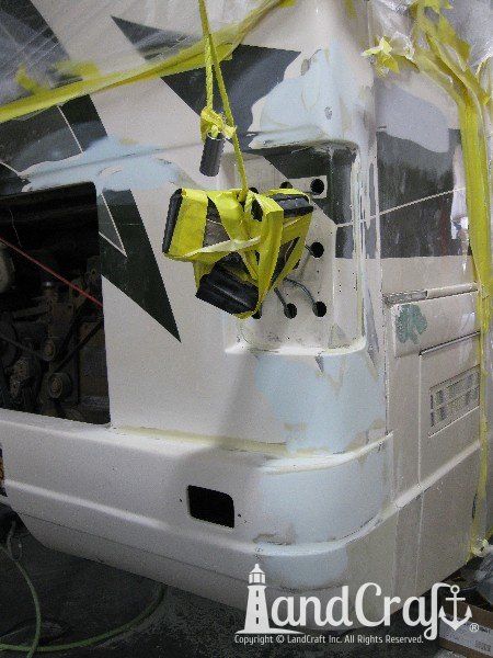 Country Coach motor coach with rear end fiberglass damage in the repair process