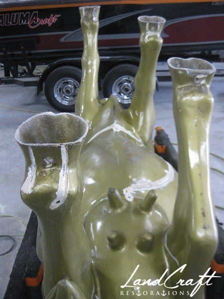 Top Cow art piece statue fiberglass structural repairs in process