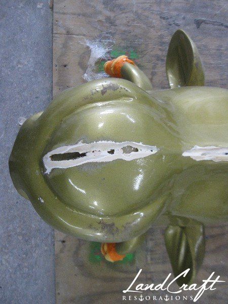 Top Cow art piece statue fiberglass structural repairs in process