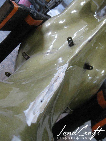 Top Cow art piece statue fiberglass structural repairs in process