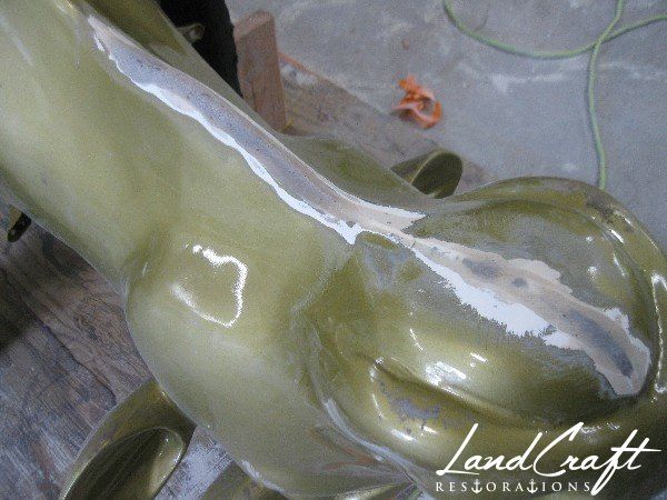 Top Cow art piece statue fiberglass structural repairs in process
