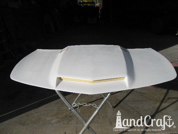 Fiberglass Chevy Camaro hood needing body and paint work