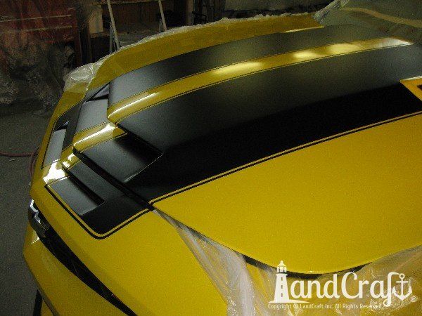 Fiberglass Chevy Camaro hood with body work, paint work and rally stripes by Keith at LandCraft