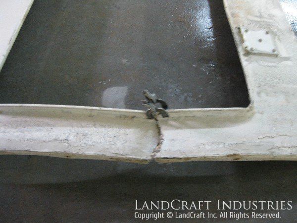 Fiberglass VOR antenna panel with fiberglass damage
