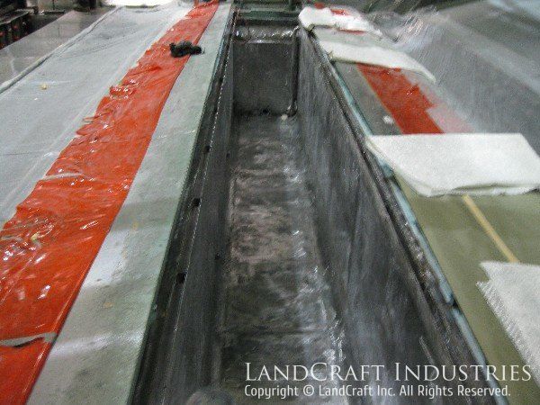 Industrial dipping tank lined in fiberglass that is failing