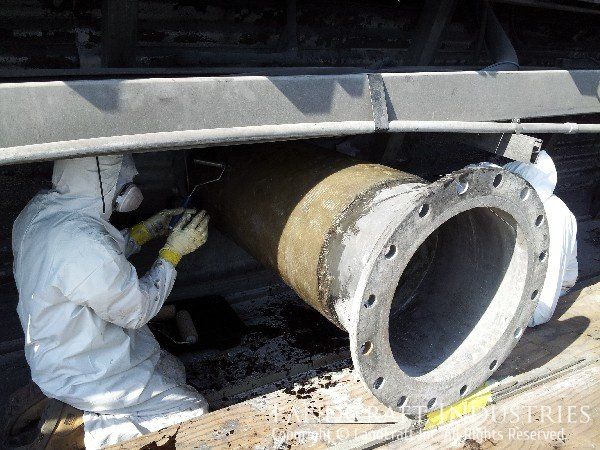 Cooling tower fiberglass pipe that is being repaired by LandCraft