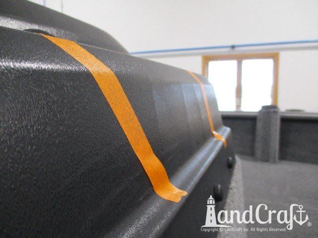 Close up picture of stress cracks in plastic console on Lund boat