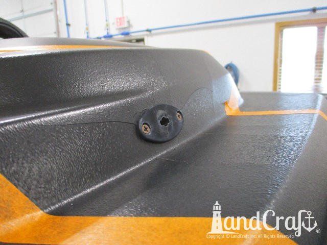 Close up picture of stress cracks in plastic console on Lund boat