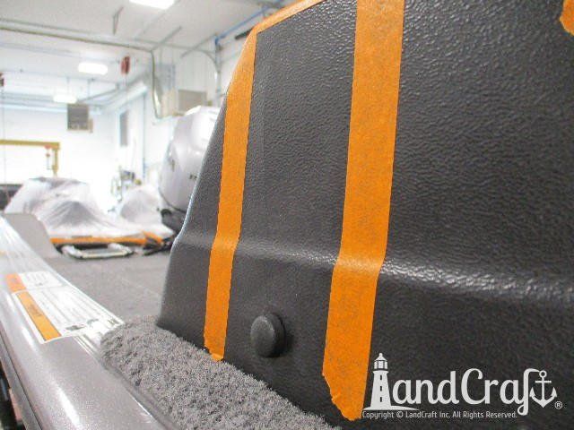 Close up picture of stress cracks in plastic console on Lund boat