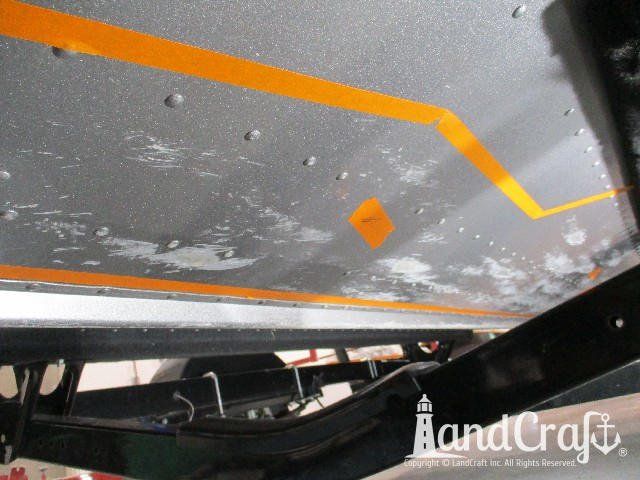 Picture of aluminum damage on bottom of a Lund boat