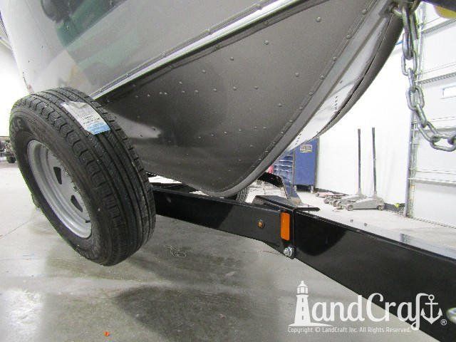 Picture of aluminum Lund boat bottom after repair and refinishing