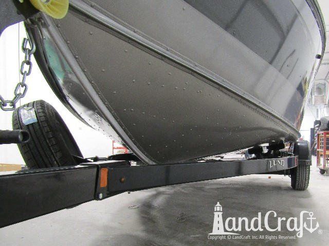 Picture of aluminum Lund boat bottom after repair and refinishing