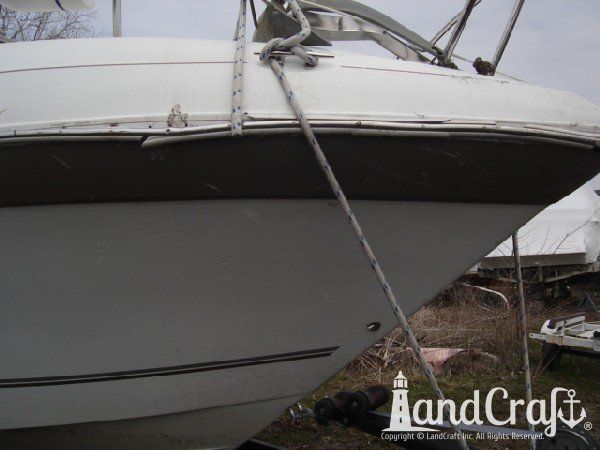 Boat with rub rail damage from impact
