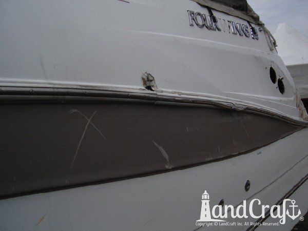 Boat with fiberglass structural and cosmetic damage