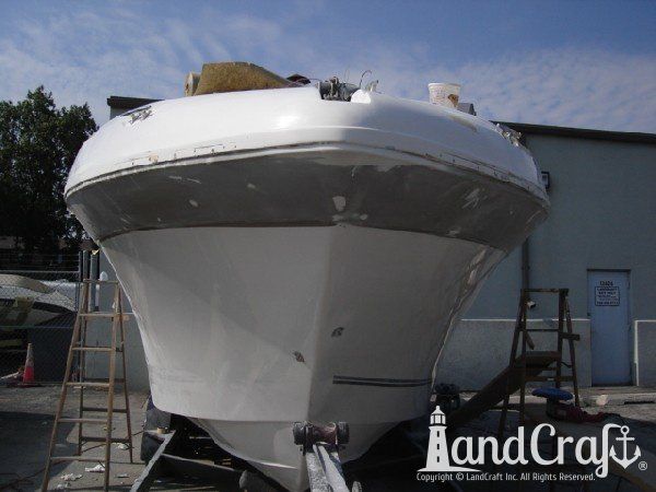 Boat with fiberglass structural and cosmetic damage in the repair process