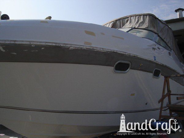 Boat with fiberglass structural and cosmetic damage in the repair process