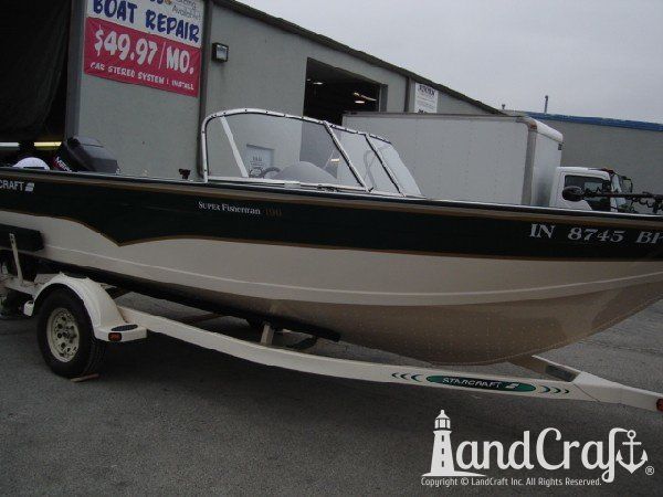 Aluminum Starcraft boat with side scratch damage