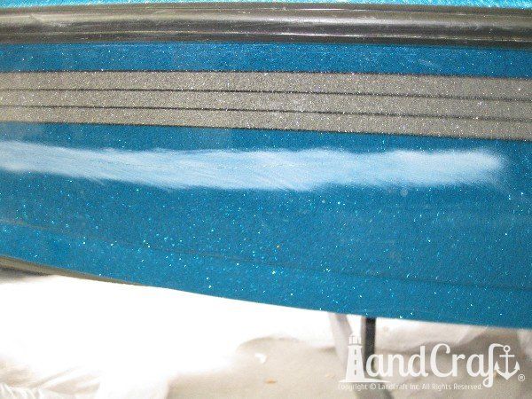 Repairing scratches on a fiberglass and metalflake Ranger boat