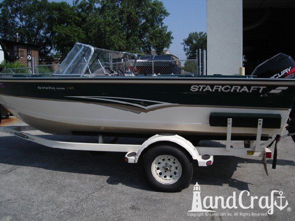 Aluminum Starcraft boat with side damage