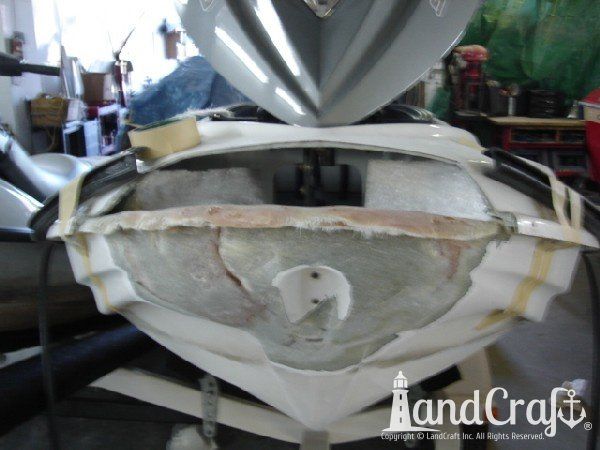 Sea Doo personal watercraft with major front end damage