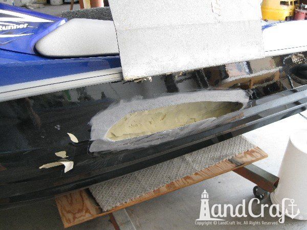 Waverunner with severe side damage in process of repair
