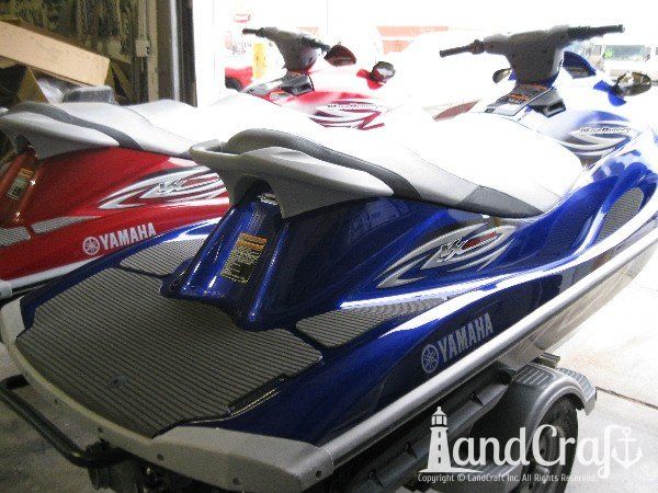 Red and Blue Yamaha waverunners completely repaired and refinished