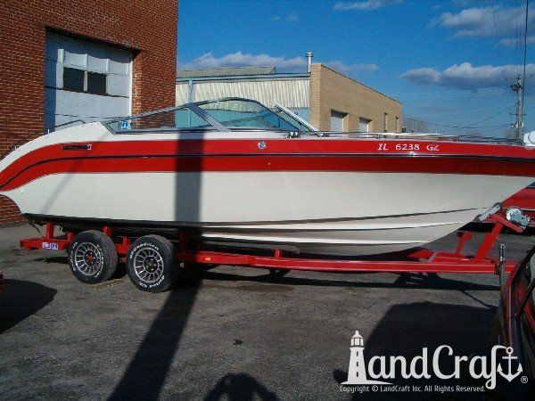 Complete exterior refinishing and color scheme change on fiberglass boat