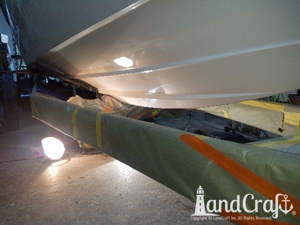Sunsation high performance boat with structural fiberglass and gelcoat repairs in process