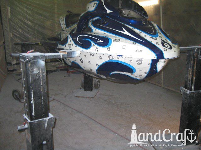 Yamaha waverunner with custom race graphics getting installed