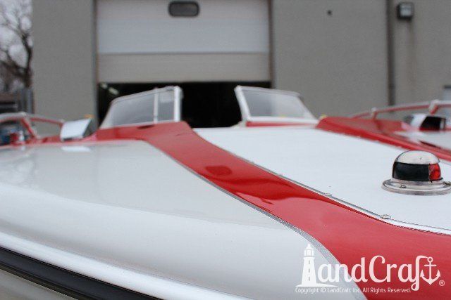 Glastron boat restoration completed in glossy white finish with red accents