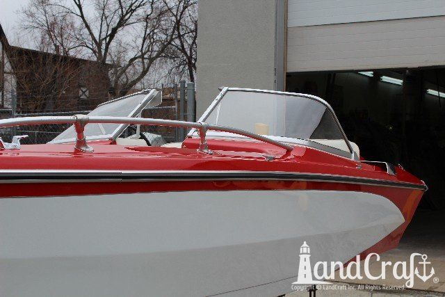 Glastron boat restoration completed in glossy white finish with red accents