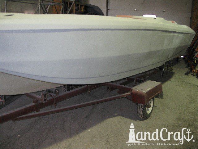 Glastron boat in the refinishing process