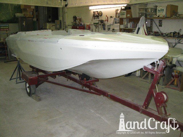 Glastron boat in the refinishing process