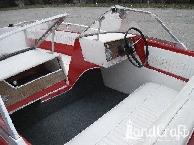 Glastron boat restoration completed with white interior, gray carpeting and clean dash work
