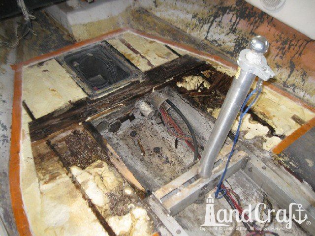 Ski Nautique 2001 boat with flooring removed and rotted wood repairs in process