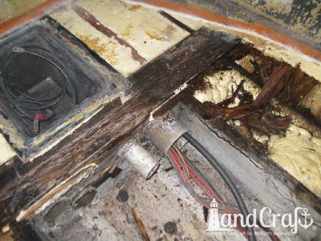 Ski Nautique 2001 boat with flooring removed and rotted wood repairs in process