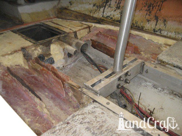 Ski Nautique 2001 boat with flooring removed and rotted wood repairs in process