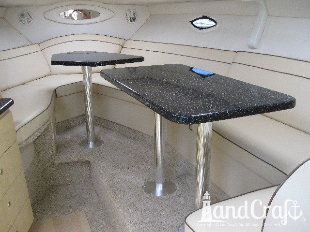 Maxum 3300 boat interior newly configured interior with new upholstery and custom granite tables installed