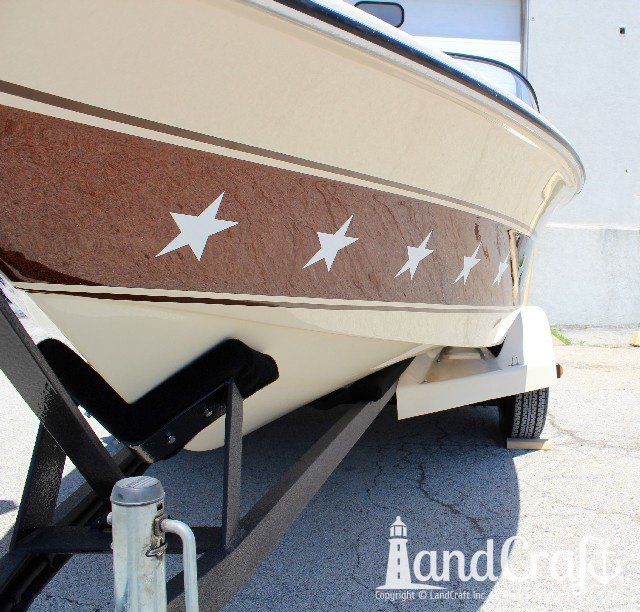 Mastercraft Stars & Stripes boat after exterior restoration with glossy metalflake and new decal stars applied