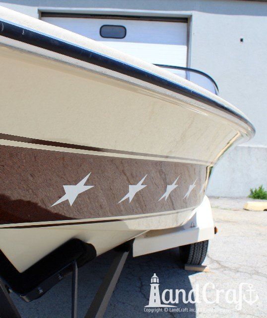 Mastercraft Stars & Stripes boat after exterior restoration with glossy metalflake and new decal stars applied